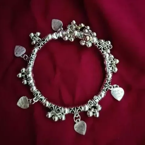 <h2>Best korean style pandora bracelet with butterfly and blue gems for women</h2> Brighten up your style with our <strong>Korean Style Pandora Bracelet with Butterfly and Blue Gems</strong>! This playful and charming bracelet is designed to bring a youthful, cheerful vibe to any outfit. With its <strong>adorable butterfly charms</strong> and sparkling <strong>blue cubic zirconia gems</strong>, it’s the perfect accessory for fun outings with friends. The <strong>silver-plated finish</strong> and <strong>whimsical design</strong> capture the essence of Korean fashion, making you feel effortlessly stylish and carefree. Whether you're dressing up for a special occasion or adding flair to your casual look, this bracelet helps you radiate joy and charm. Made from durable <strong>brass and copper</strong> with an <strong>adjustable fit</strong> for ultimate comfort, this bracelet is easy to wear and suits a variety of wrist sizes. The high-quality cubic zirconia stones add just the right amount of sparkle, making it a standout piece in any jewelry collection. Ideal for those who love a touch of fun and elegance, this butterfly charm bracelet is sure to make you feel young and lively. 12 korean style silver plated bracelet with cute heart shape hangings for women