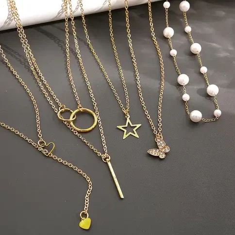 Layered necklace combo for women with pearls and heart shape pendants