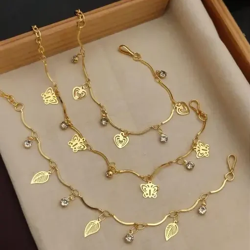 <h2>Trendy Korean Butterfly ear chain with american diamond stone</h2> Looking for a <strong>thoughtful gift</strong> with a meaningful touch? Our <strong>Trendy Korean Butterfly Ear Chain with American Diamond Stone</strong> makes an elegant choice for all occasions, whether it’s a birthday, anniversary, or any special celebration. With a timeless butterfly design paired with sparkling cubic zirconia, these chandelier earrings symbolize grace and beauty, making them a <strong>perfect gift</strong> that anyone will treasure. Crafted from high-quality <strong>alloy</strong> and <strong>gold-plated</strong> for a luxurious finish, these earrings are designed for durability and comfort. The adjustable chain ensures a secure fit, while the beautiful stones add a touch of sophistication. Whether for daily wear or special events, these earrings make a lovely and lasting gift for someone special. 15 Gold Plated korean fashion style bracelet with butterfly and heart hangings for women